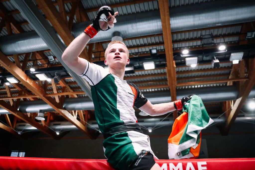 Kian McCarton Describes Bouncing Back From Previous Losses to Take Strawweight Gold