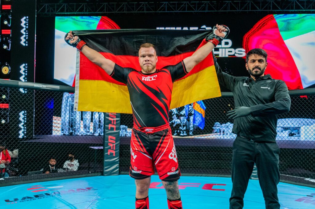 Tobiasz Le Claims Statement Victory at KSW 99, Tom Hölemann Gets Pro Career Off to a Winning Start | IMMAF Alumni Recap